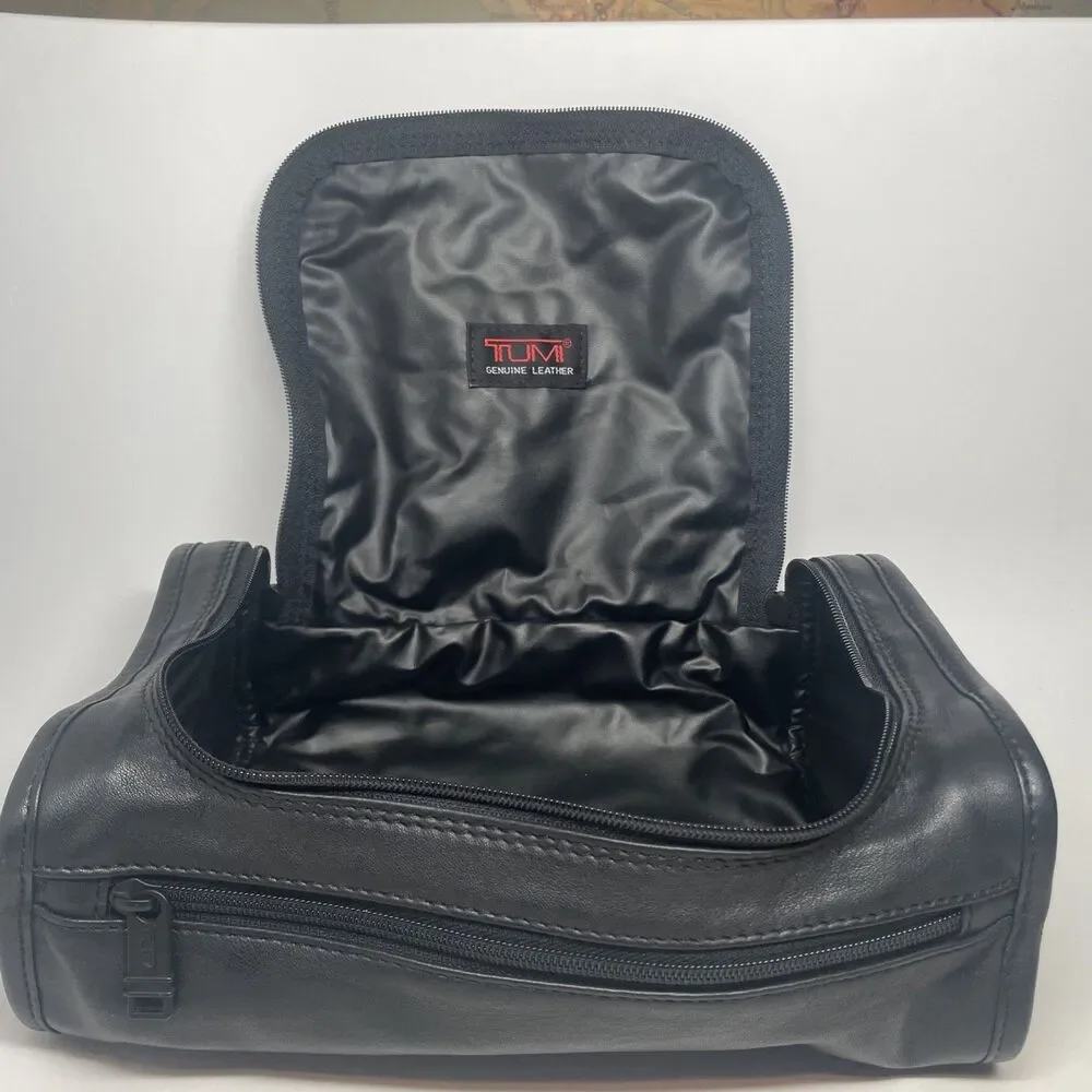 Tumi black leather